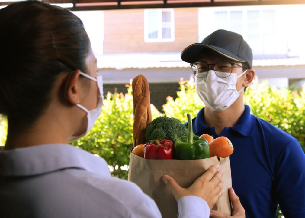 Which jobs are included in top priority essential workers?